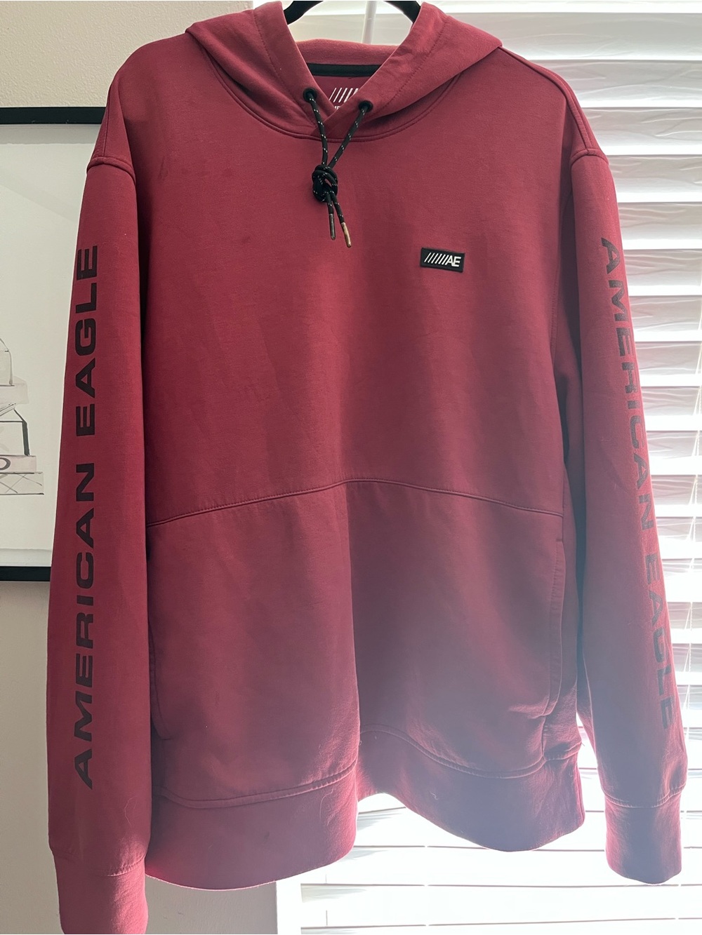 American Eagle Outfitters Burgundy Pullover Hoodie with Sleeve Logo